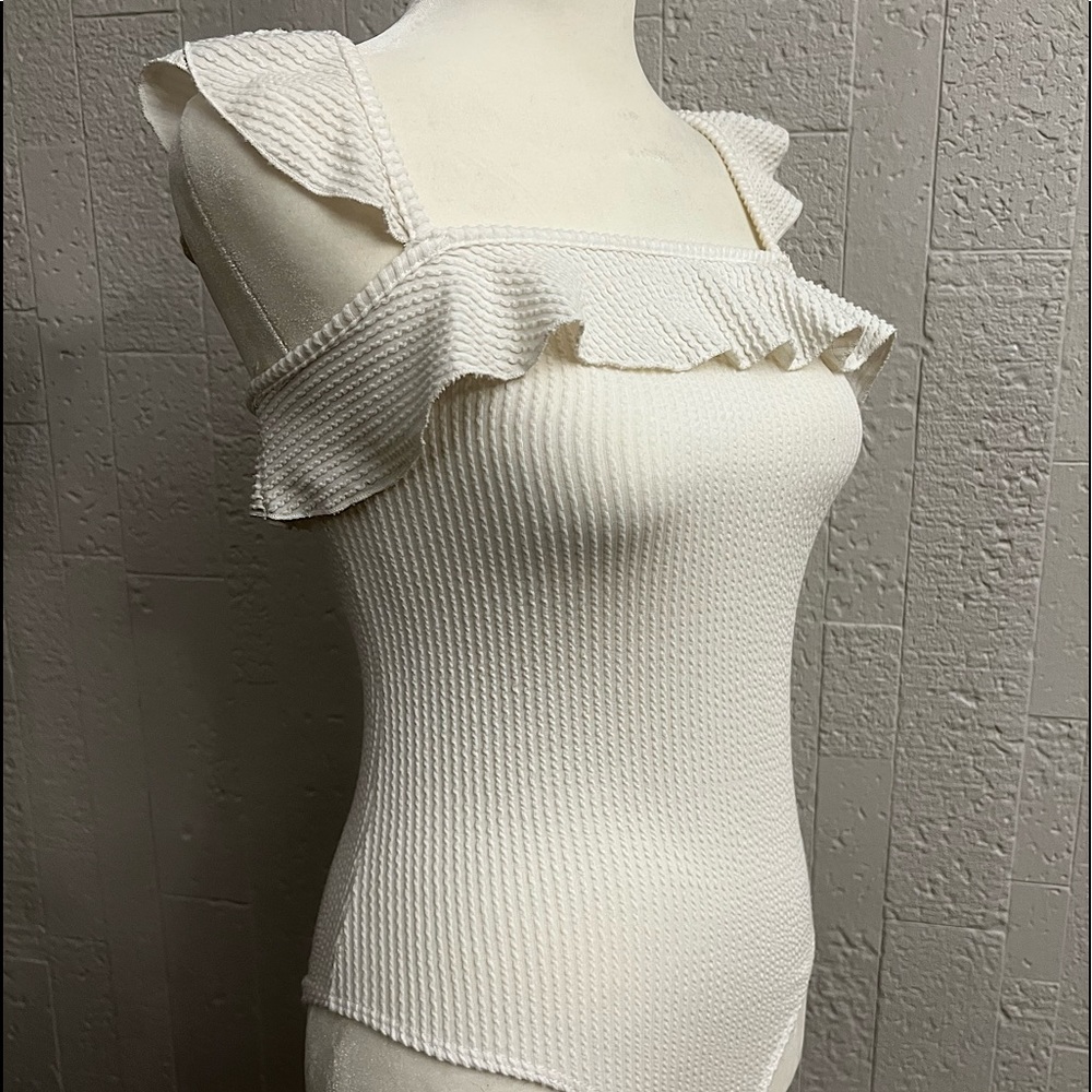 white bodysuit